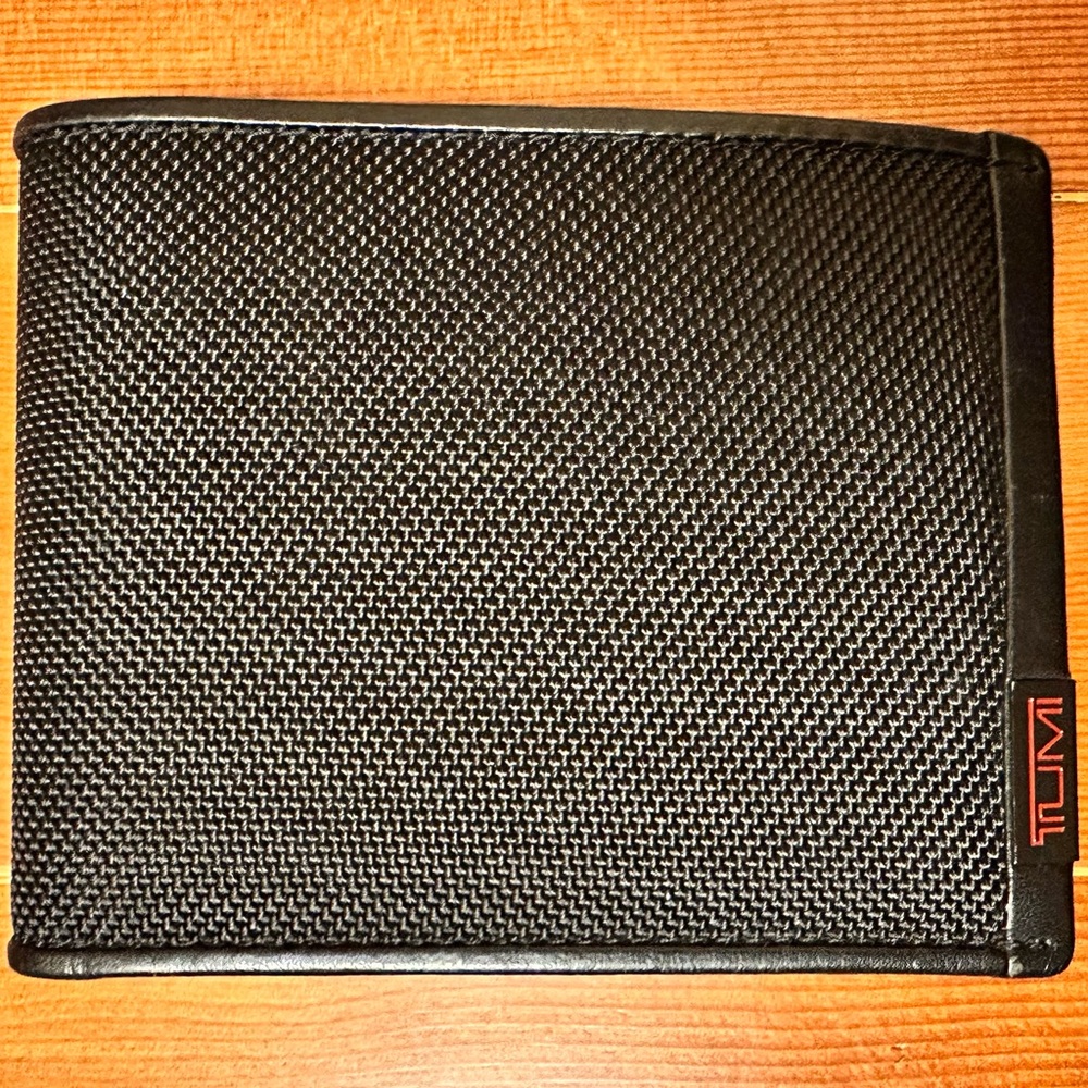 TUMI Black Woven Wallet NWT leather interior side pockets